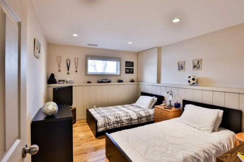 243 N 200 W, Raymond, AB - Indoor Photo Showing Bedroom