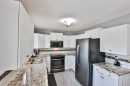 243 N 200 W, Raymond, AB  - Indoor Photo Showing Kitchen With Double Sink 