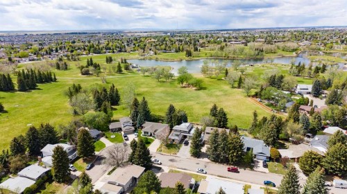 9 Queens Road West, Lethbridge, AB - Outdoor With Body Of Water With View