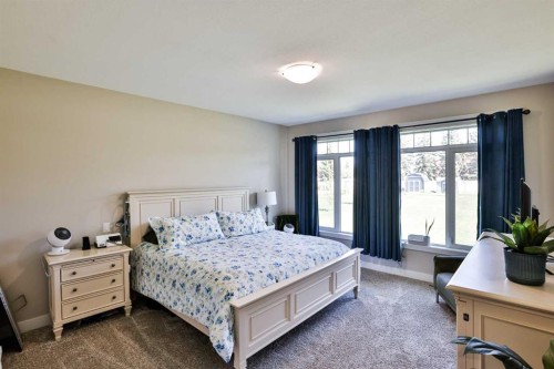 19 S 300 W, Raymond, AB - Indoor Photo Showing Bedroom
