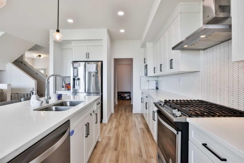 134 Greywolf Road North, Lethbridge, AB - Indoor Photo Showing Kitchen With Double Sink With Upgraded Kitchen