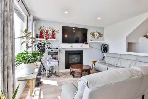 134 Greywolf Road North, Lethbridge, AB - Indoor Photo Showing Living Room With Fireplace