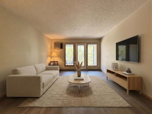 208-75 1 Avenue South, Lethbridge, AB - Indoor Photo Showing Living Room