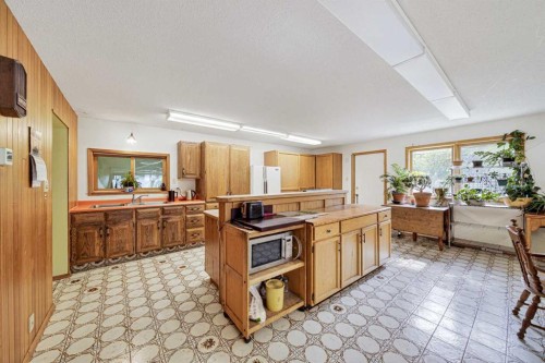 12145 21Ave, Blairmore, AB - Indoor Photo Showing Kitchen With Double Sink