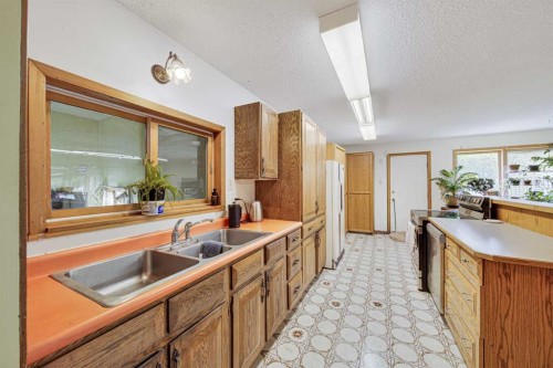 12145 21Ave, Blairmore, AB - Indoor Photo Showing Kitchen With Double Sink