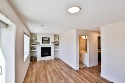 8618 25 Avenue, Coleman, AB - Indoor With Fireplace