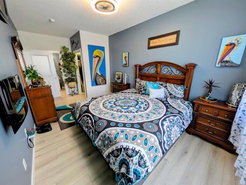 83 Harvest Square, Claresholm, AB - Indoor Photo Showing Bedroom
