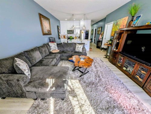 83 Harvest Square, Claresholm, AB - Indoor Photo Showing Living Room