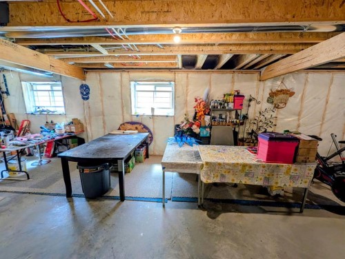83 Harvest Square, Claresholm, AB - Indoor Photo Showing Basement