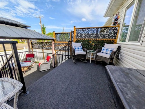 83 Harvest Square, Claresholm, AB - Outdoor With Deck Patio Veranda With Exterior