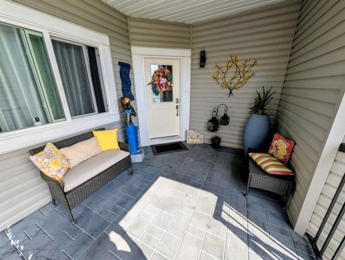 83 Harvest Square, Claresholm, AB - Outdoor With Deck Patio Veranda With Exterior
