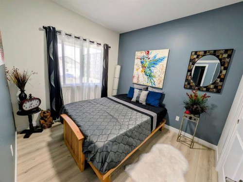 83 Harvest Square, Claresholm, AB - Indoor Photo Showing Bedroom