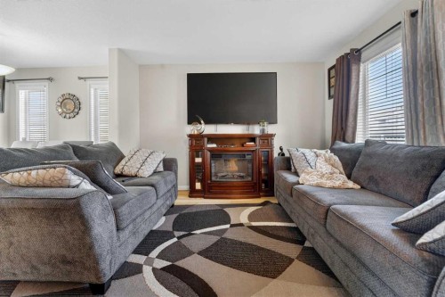 786 Silkstone Close West, Lethbridge, AB - Indoor Photo Showing Living Room With Fireplace