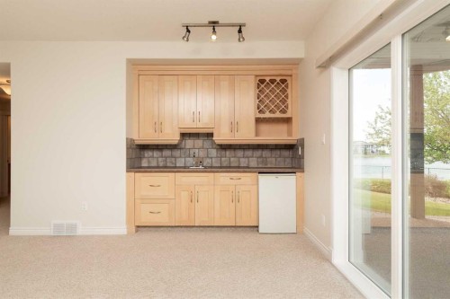73 Fairmont Park Landing South, Lethbridge, AB - Indoor Photo Showing Kitchen With Double Sink