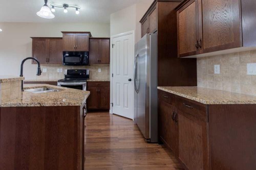 5 Coalbanks Link West, Lethbridge, AB - Indoor Photo Showing Kitchen With Double Sink