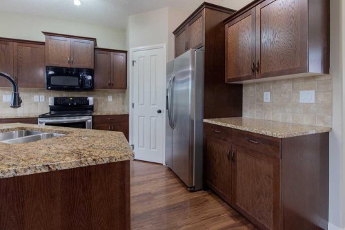 5 Coalbanks Link West, Lethbridge, AB - Indoor Photo Showing Kitchen With Double Sink