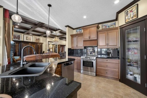 135 Garrison Drive, Fort Macleod, AB - Indoor Photo Showing Kitchen With Double Sink