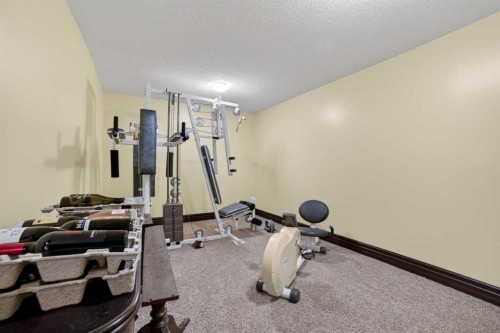 135 Garrison Drive, Fort Macleod, AB - Indoor Photo Showing Gym Room