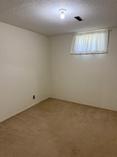 232 Rubie Crescent, Nobleford, AB - Indoor Photo Showing Other Room