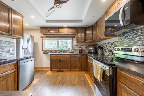 2241 21 Avenue, Coaldale, AB - Indoor Photo Showing Kitchen With Stainless Steel Kitchen With Double Sink