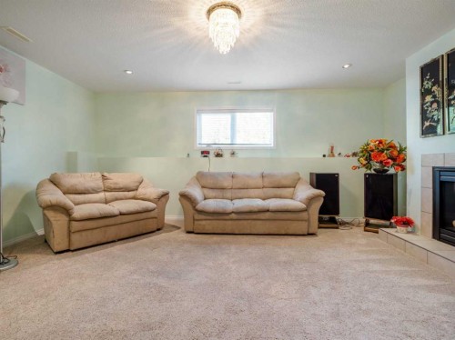 827 Kodiak Bay North, Lethbridge, AB - Indoor With Fireplace
