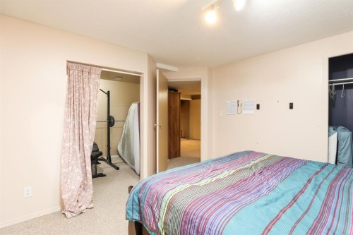 18 Garden Place, Magrath, AB - Indoor Photo Showing Bedroom