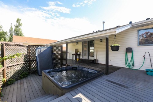 18 Garden Place, Magrath, AB - Outdoor With Deck Patio Veranda With Exterior
