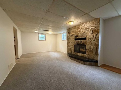 520 20 Street South, Lethbridge, AB - Indoor Photo Showing Other Room With Fireplace