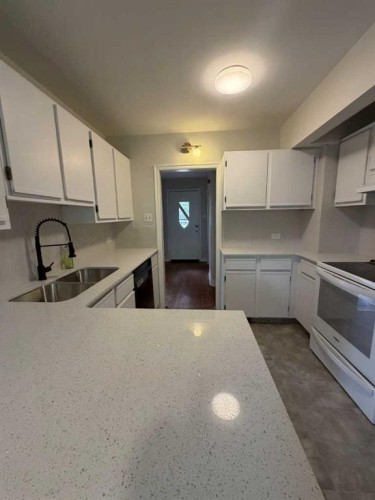 520 20 Street South, Lethbridge, AB - Indoor Photo Showing Kitchen With Double Sink