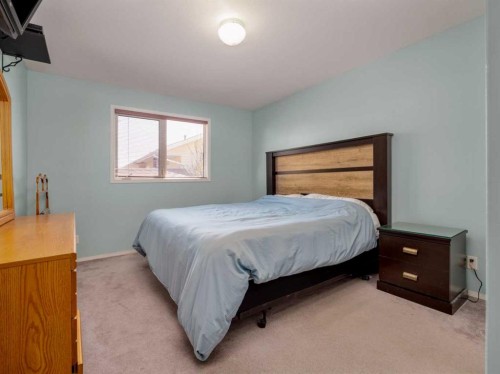 6005 46A Street, Taber, AB - Indoor Photo Showing Bedroom