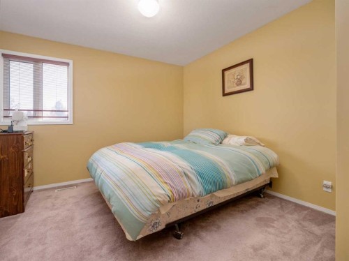 6005 46A Street, Taber, AB - Indoor Photo Showing Bedroom