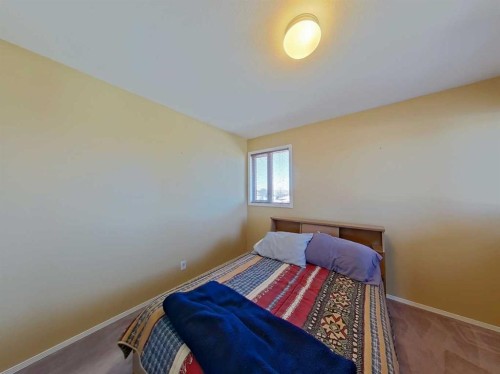 6005 46A Street, Taber, AB - Indoor Photo Showing Bedroom