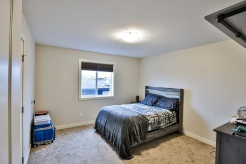865 Atlantic Cove West, Lethbridge, AB - Indoor Photo Showing Bedroom