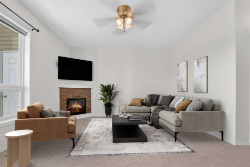 28-45 Keystone Terrace West, Lethbridge, AB - Indoor Photo Showing Living Room With Fireplace