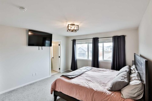 1109 Pacific Circle West, Lethbridge, AB - Indoor Photo Showing Bedroom