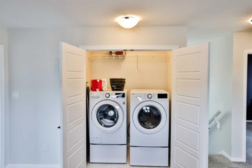 1109 Pacific Circle West, Lethbridge, AB - Indoor Photo Showing Laundry Room