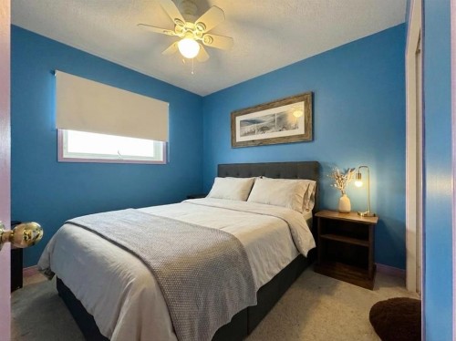 93 Heritage Crescent West, Lethbridge, AB - Indoor Photo Showing Bedroom