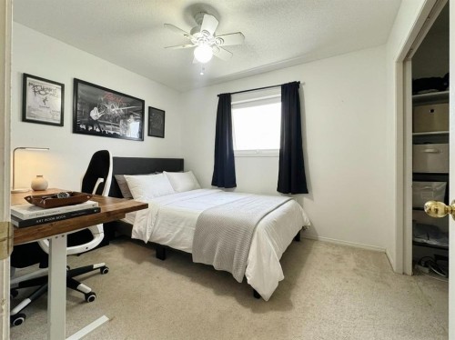 93 Heritage Crescent West, Lethbridge, AB - Indoor Photo Showing Bedroom