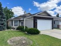 93 Heritage Crescent West, Lethbridge, AB  - Outdoor With Facade 