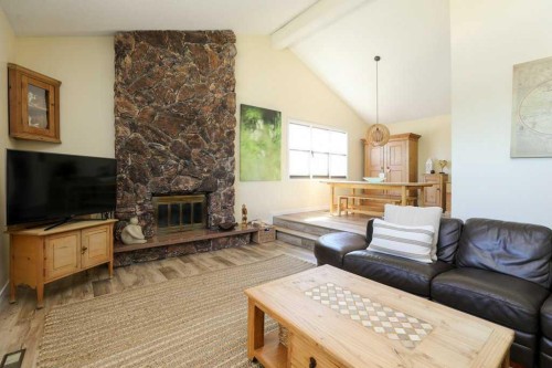 729 Columbia Boulevard West, Lethbridge, AB - Indoor Photo Showing Living Room With Fireplace