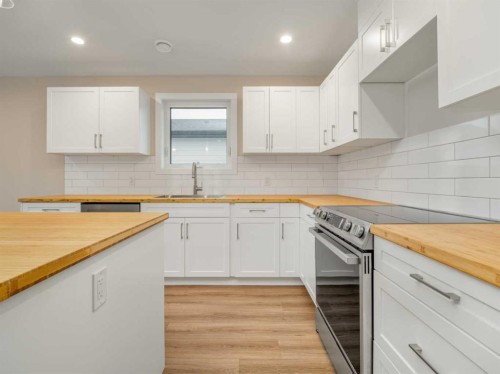 4818 72 Avenue, Taber, AB - Indoor Photo Showing Kitchen