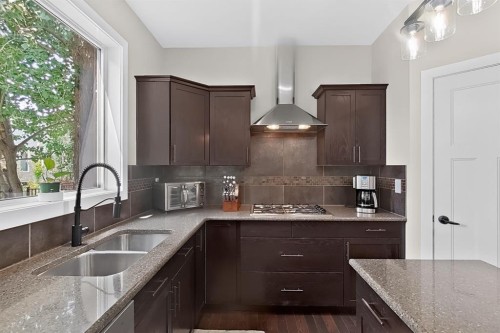 1596 Coalbanks Boulevard West, Lethbridge, AB - Indoor Photo Showing Kitchen With Double Sink