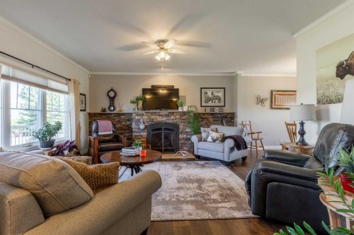 325 8 Avenue, Granum, AB - Indoor Photo Showing Living Room With Fireplace