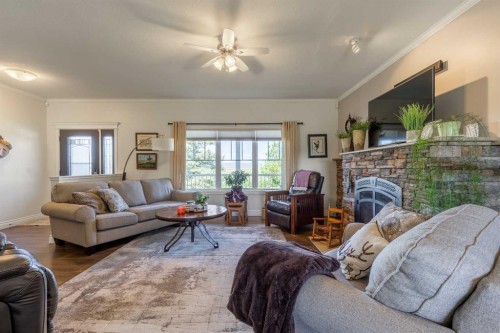 325 8 Avenue, Granum, AB - Indoor Photo Showing Living Room With Fireplace
