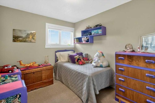 63 Wildwood Crescent West, Lethbridge, AB - Indoor Photo Showing Bedroom
