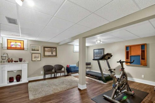 63 Wildwood Crescent West, Lethbridge, AB - Indoor Photo Showing Gym Room