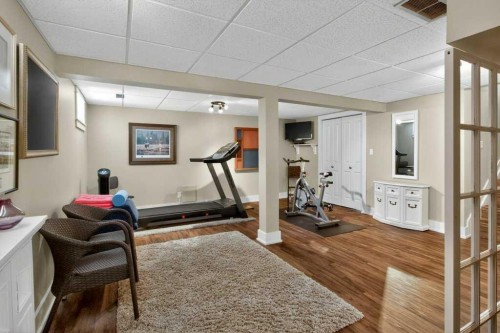 63 Wildwood Crescent West, Lethbridge, AB - Indoor Photo Showing Gym Room
