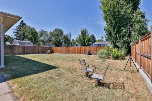 96 Oxford Road West, Lethbridge, AB - Outdoor With Backyard