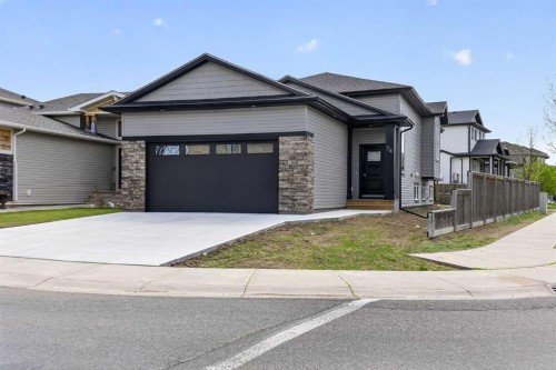 74 Riverpark Boulevard West, Lethbridge, AB - Outdoor With Facade