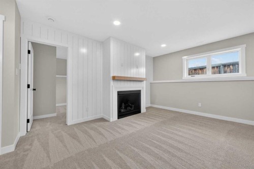 74 Riverpark Boulevard West, Lethbridge, AB - Indoor With Fireplace